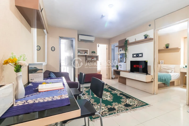 Living Room Peaceful 3BR Apartment at Bassura City Apartment Tower Geranium