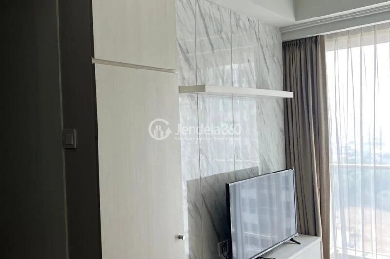 Living Room Flawless 2BR Apartment at Green Sedayu Apartment Middle Floor