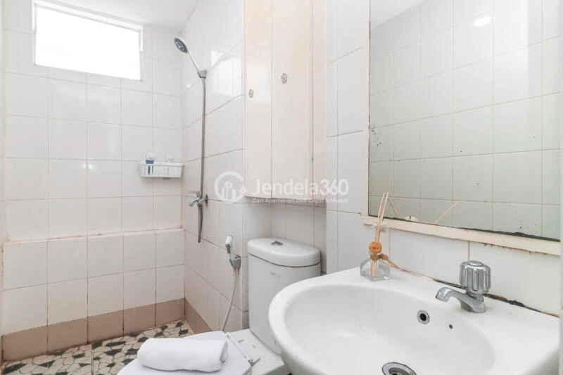 Bathroom Peaceful 3BR Apartment at Bassura City Apartment Tower Geranium