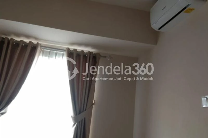 Bedroom 1 Comfy 2BR Apartment Close to Living Plaza Cinere at Cinere Resort Apartment Tower Senggigi