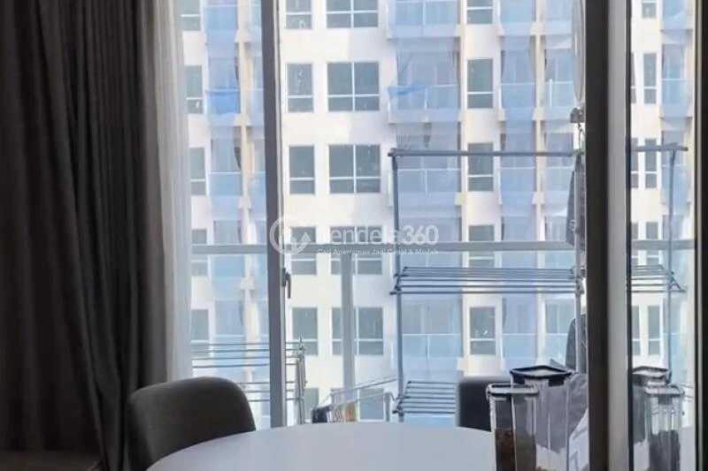 Living Room Excellent 2BR Apartment High Floor with City View at Green Sedayu Apartment
