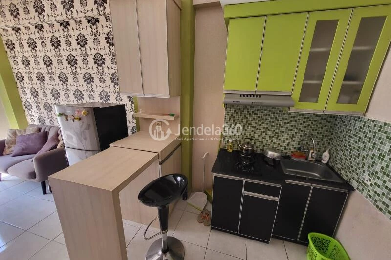 Kitchen 2BR Apartment with Swimming Pool View at Grand Centerpoint Apartment