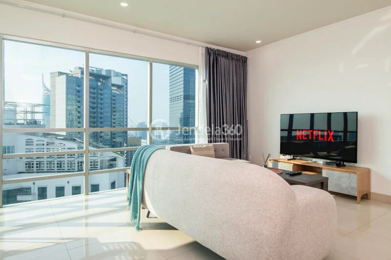 Living Room High Floor 3BR Apartment with City View at Sahid Sudirman Residence