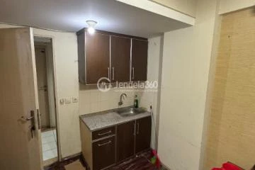 Kitchen Restful 2BR Apartment Low Floor with  View at Grand Centerpoint Apartment