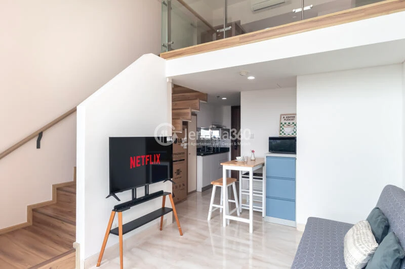 Living Room Studio Apartment with City View at Southgate Residence