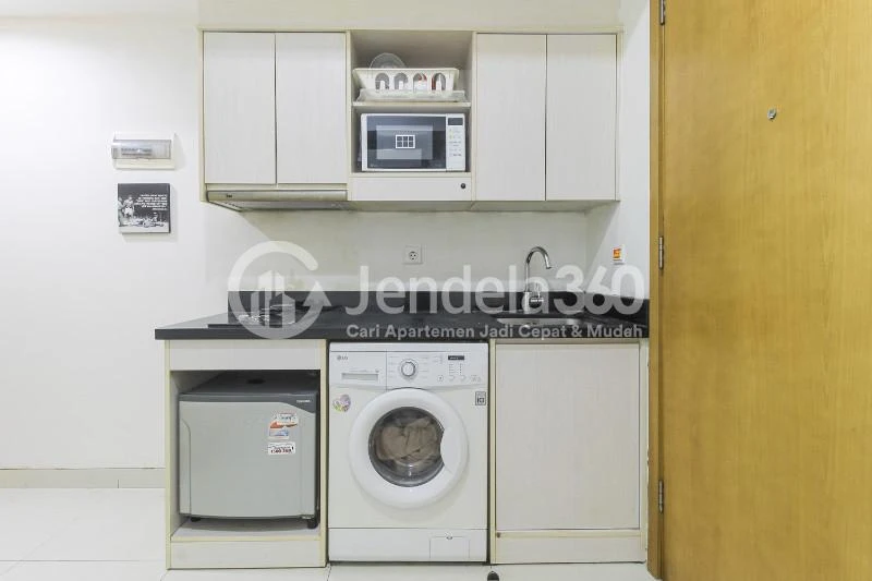 Kitchen Middle Floor 1BR Apartment with Golf view View at The Mansion Kemayoran Bougenville
