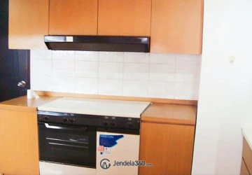 Kitchen Comfortable 2BR Apartment at Grand Tropic Suites Apartment Low Floor