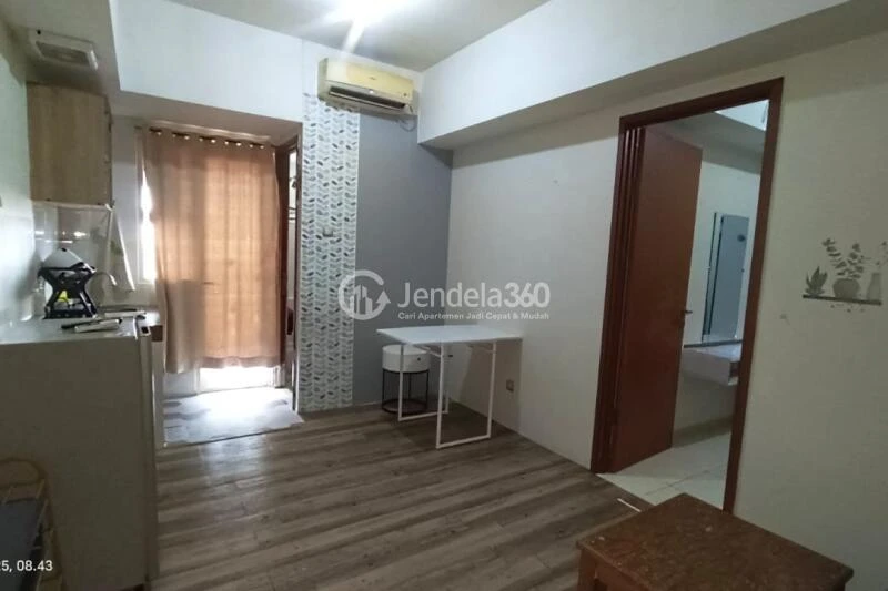 Living Room 1BR Green Lake View Apartment at Tower E