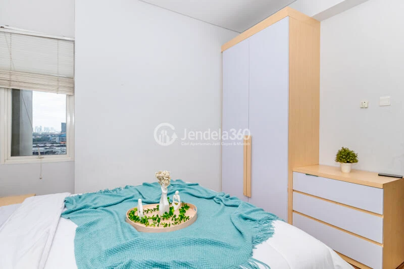 Bedroom 1 2BR Aspen Residence Apartment at Middle Floor with An Eye Pleasing Interior