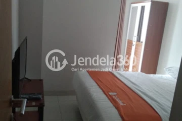 Bedroom Relaxed 1BR Apartment Middle Floor with city View at The Mansion Kemayoran Bougenville