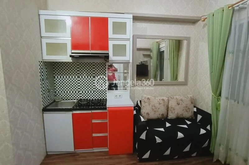 Kitchen 2BR Green Pramuka City Apartment at Middle Floor