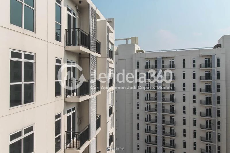 Balcony Restful Stduio Apartment with City View from The Top Floor at Puri Orchard Apartment