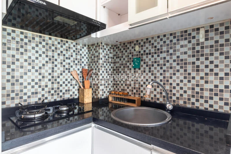 Kitchen Low Floor 1BR Apartment with City View at Callia Apartment