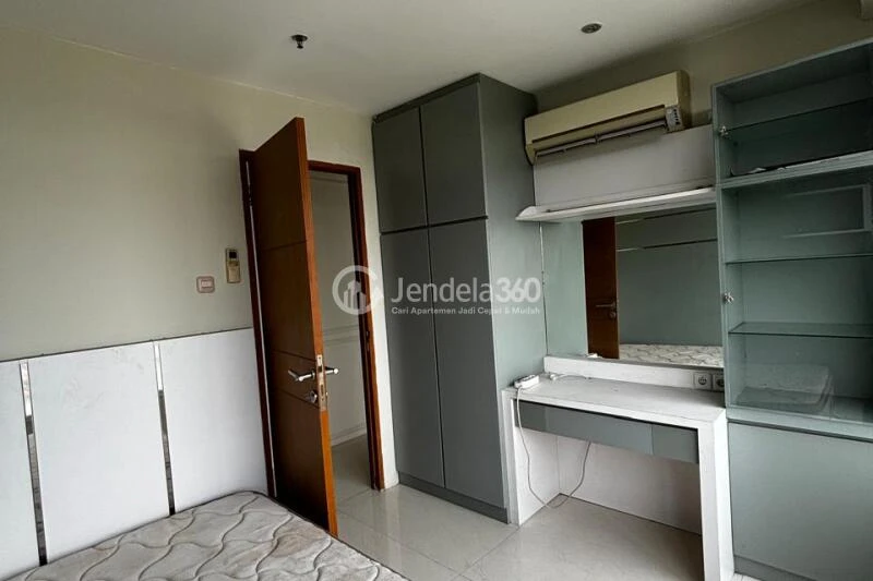Bedroom 3 Restful 5BR Apartment High Floor with Whoosh Station View at Patria Park Apartment