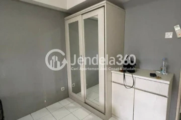 Bedroom Elegant Studio Apartment Middle Floor with City View at Kalibata City Apartment