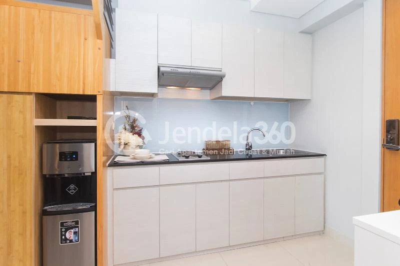Kitchen Well Furnished 2BR Apartment Close to MNC Studio Kebon Jeruk at Maqna Residence