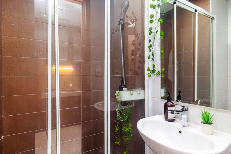 Bathroom Puri Orchard Apartment Studio View pool and city