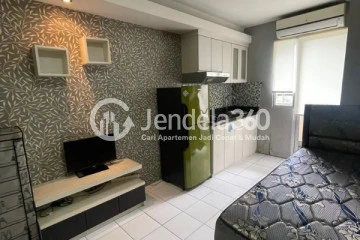 Bedroom Elegant Studio Apartment Middle Floor with City View at Kalibata City Apartment