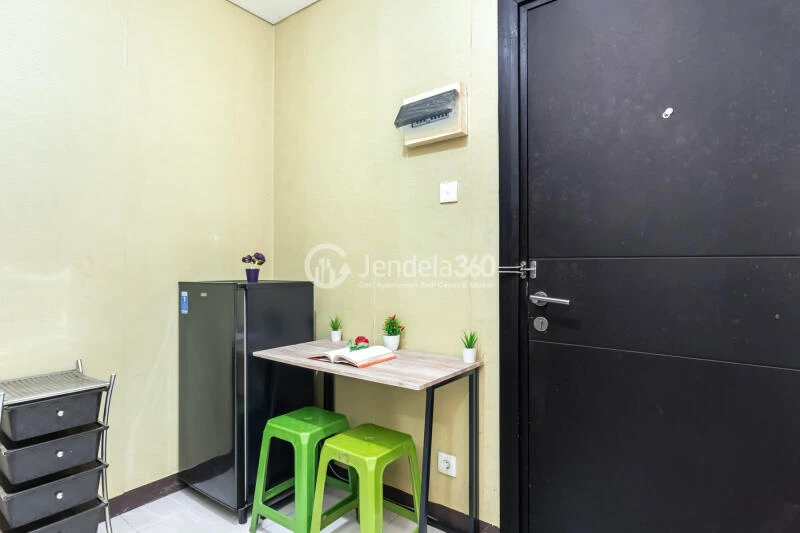 Living Room Studio Apartment with City View at Nifarro Park Apartment