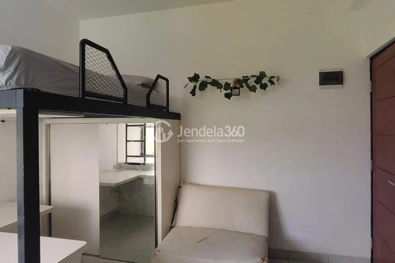 Bedroom Compact Studio Apartment Low Floor with Garden View at EcoHome Citra Raya