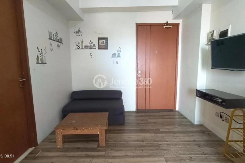 Living Room 1BR Green Lake View Apartment at Tower E