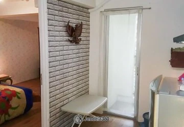 Living Room Modern 1BR Apartment Middle Floor with swimming pool View at Bassura City Apartment