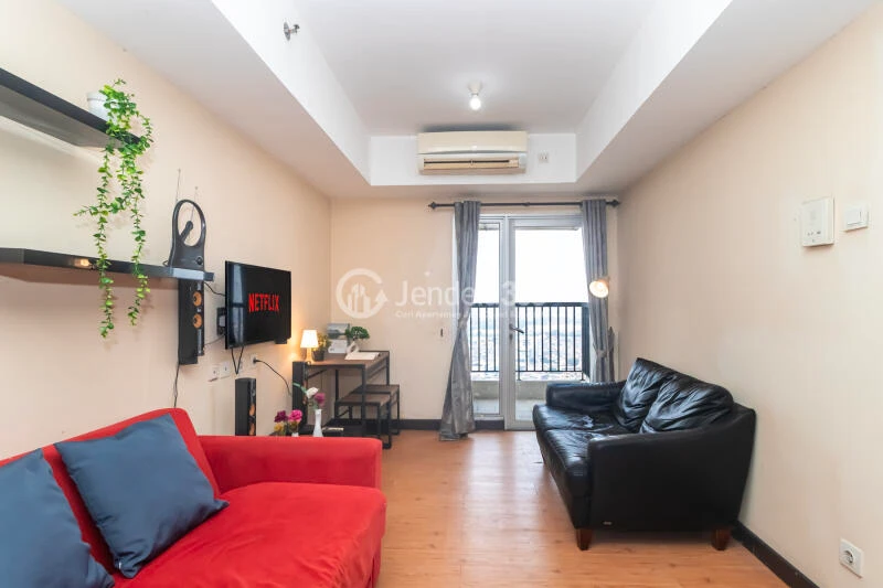 Living Room 1BR Apartment with City View at The Wave Apartment