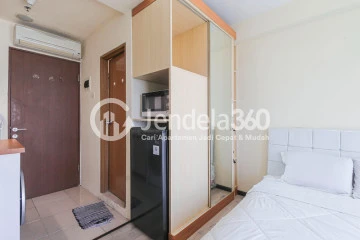 Bedroom High Floor Studio Apartment with Jakarta International Equestrian Park View at Tifolia Apartment