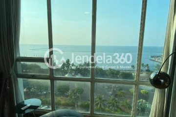 Living Room Cozy 3BR Apartment at Ancol Mansion Apartment Tower Atlantic Ocean