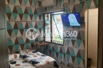 Bedroom Tidy 1BR Apartment Low Floor with  View at EcoHome Citra Raya