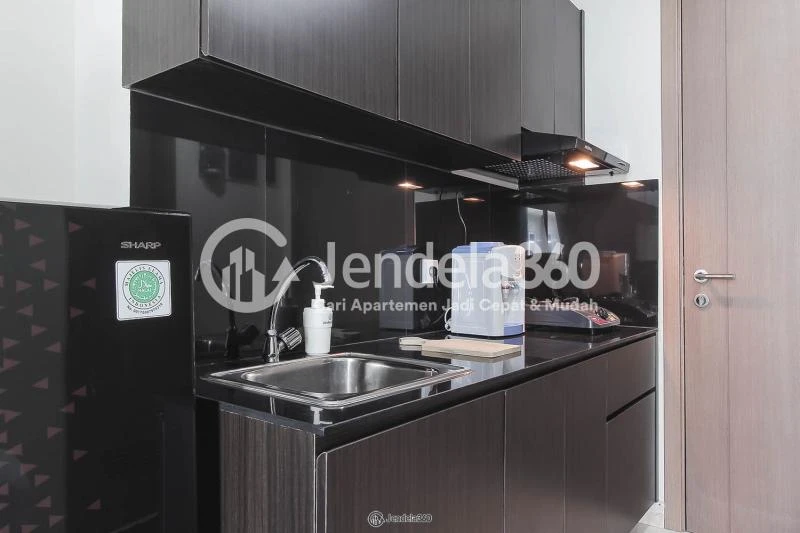 Kitchen Restful Stduio Apartment with City View from The Top Floor at Puri Orchard Apartment