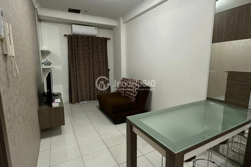 Living Room 1BR Apartment with City View at Signature Park Apartment