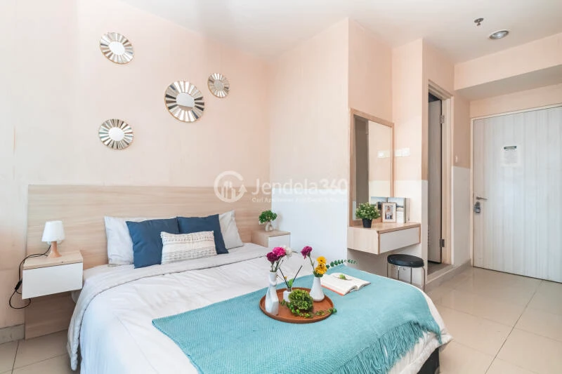 Bedroom High Floor Studio Apartment with City View at Grand Kamala Lagoon Apartment