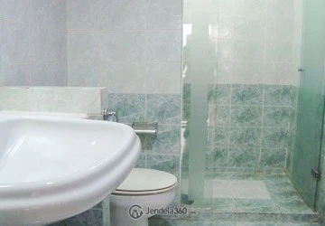 Bathroom Comfortable 2BR Apartment at Grand Tropic Suites Apartment Low Floor