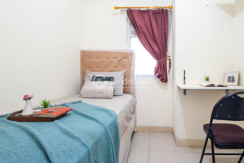 Bedroom 2 Low Floor 2BR Apartment with Swimming Pool View at Green Pramuka City Apartment