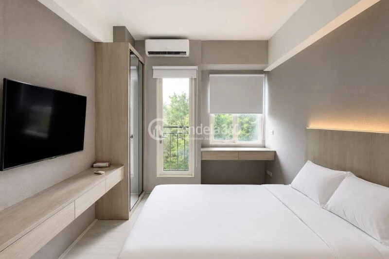 Bedroom Stylish Studio Apartment at Podomoro Golf View Apartment Tower Cordia