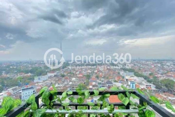 View Elegant 2BR Apartment at Grand Asia Afrika Residence Middle Floor