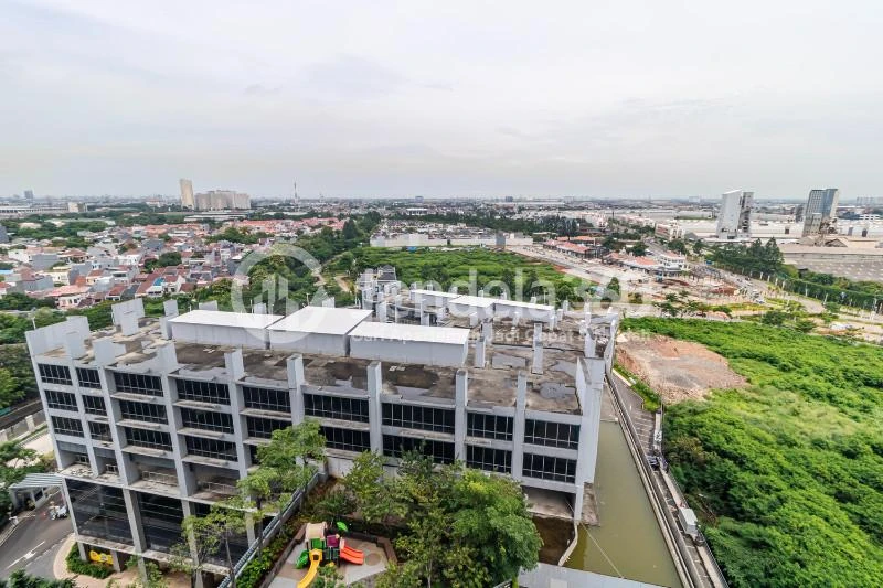 Balcony Low Floor Studio Apartment with City View at Sedayu City Apartment