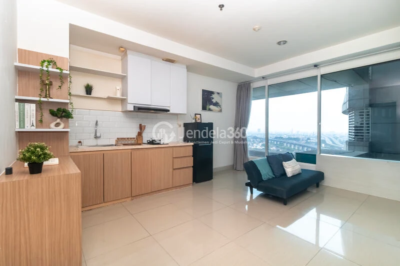 Kitchen Comfortable 2BR Apartment at Grand Kamala Lagoon Apartment Tower Emerald North