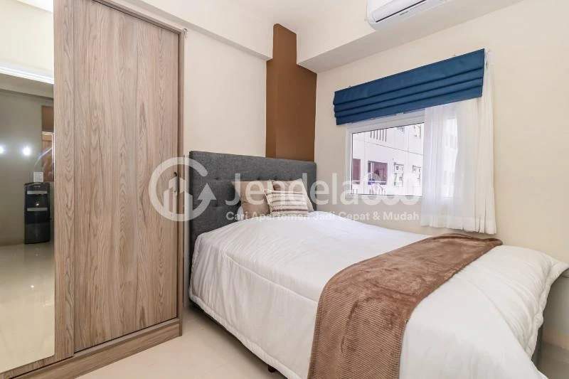 Bedroom 1 Decorative 2BR Apartment at Green Pramuka City Apartment Tower Nerine