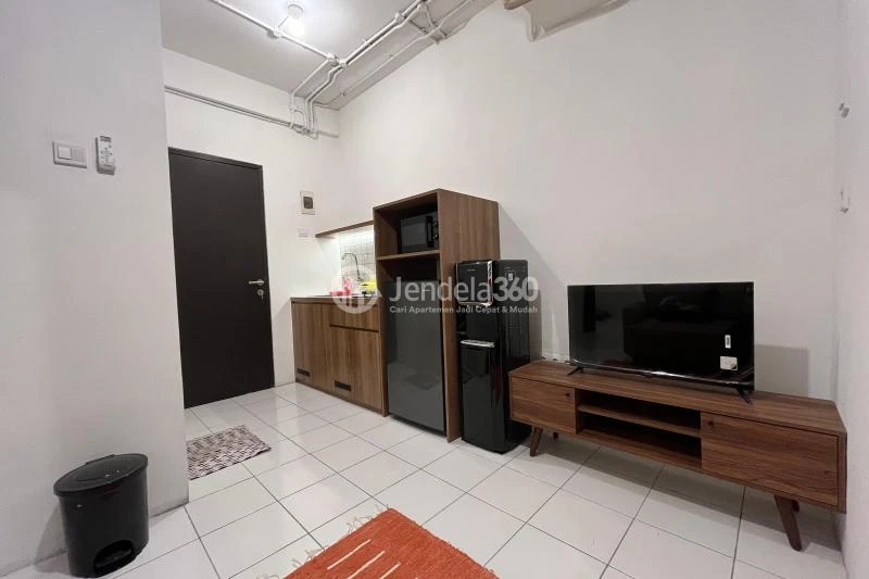 Living Room Middle Floor 2BR Apartment with Hotel View at Grand Asia Afrika Residence