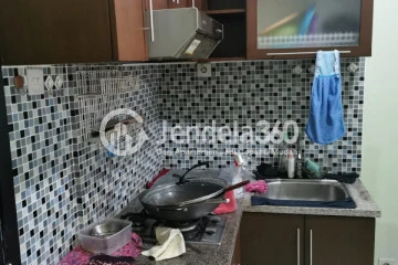 Kitchen High Floor 2BR Apartment with City View at Salemba Residence