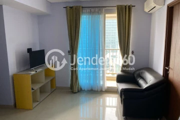 Living Room Well Located 2BR Apartment Near East Jakarta Industry Area with City View at Callia Apartment