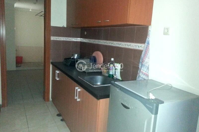 Kitchen High Floor 3BR Apartment with North View at Grand Palace Kemayoran